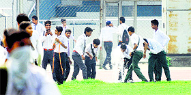 ‘Rehearse’ osmosis: Schoolchildren drink water from a sprinkler at Guru Nanak Stadium in Ludhiana. More than 1,000 schoolchildren will present cultural items on August 15. Charanjit Singh Atwal, Speaker, Punjab Vidhan Sabha, will be the chief guest. He will unfurl the National Flag at Guru Nanak Stadium. The district administration will honour freedom fighters. Tricycles and sewing machines will be given to the poor.