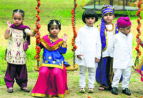 Children celebrate Teej at Punjab Agricultural University in Ludhiana on Tuesday.