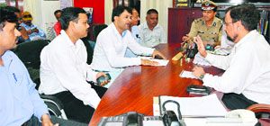 Members of the UKD meet DGP BS Sidhu at his office in Dehradun on Tuesday.