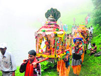 Devotees carry the palanquin of Goddess Nanda Devi during the Nanda Devi Raj Jaat Yatra.