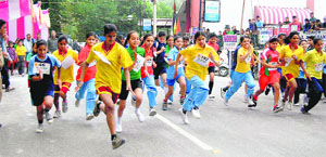 Students of various schools take part in a cross-country race in Mussoorie on Tuesday.