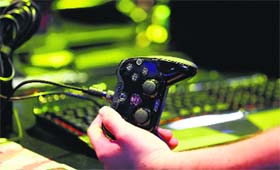 A video game controller is seen at the Gamescom 2014 fair in Cologne on Wednesday. The Gamescom convention, Europes largest video games trade fair, runs from August 13 to August 17