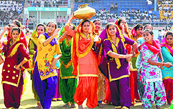 Students perform a cultural item during the full dress rehearsal ahead of the Independence Day function in Bathinda on Wednesday