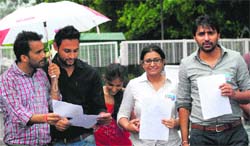 Members of the NSUI come out from the VC office at the PU after submitting a memorandum. Tribune Photo: S Chandan