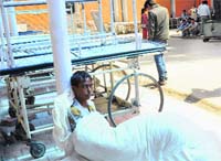 An ailing person, later found to be suffering from tuberculosis, abandoned in front of the PGI Emergency in Chandigarh. A file photo