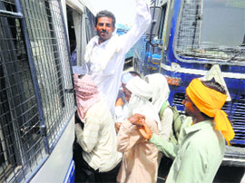 Government employees court arrest outside the Mini-secretariat in Sirsa on Wednesday