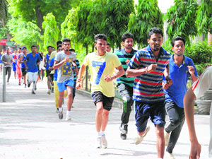 Students of Government Rajindra College participate in a country race organised by the college to spread awareness about drug menace in Bathinda on Thursday.