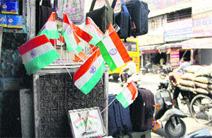 Plastic flags being sold in markets in violation of the Flag Code 2002 in Jalandhar on Thursday.