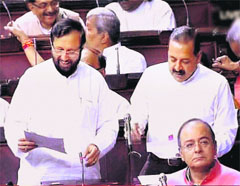 I&B Minister Prakash Javadekar (left) speaks in the Rajya Sabha in New Delhi on Thursday