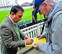 Sunil Gavaskar obliging one of the autograph hunters at the Oval in London on Thursday
