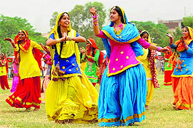 Girls perform giddha in Mohali on Friday.
