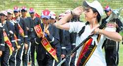 Schoolchildren take part in march past during Independence Day celebrations at Bakshi Stadium in Srinagar. Tribune photo: Amin War