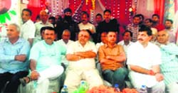 Bishnah MLA Ashwani (third from right) at a BJP function in Jammu on Saturday. A Tribune Photograph