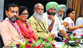 AAP leader Yogender Yadav addresses a seminar on education in Ludhiana on Saturday.