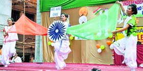 Students of Green Land Senior Secondary School present a dance on Independence Day in Ludhiana.