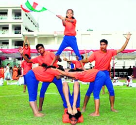 students of BCM Arya Model Senior Secondary School present an item.