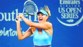 Maria Sharapova returns to Simona Halep during their quarterfinal match of the Western & Southern Open in Cincinnati on Friday.