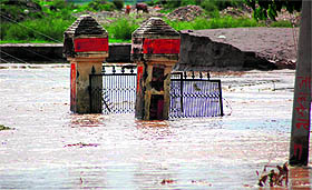 A submerged gate at Bairagi Camp in Haridwar
