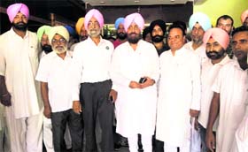 PPCC chief Partap Singh Bajwa with members of the BKU (Mann) after the organisation extended its support to the partys candidate in Talwandi Sabo
