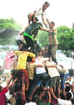 Youths form a human pyramid to break the dahi-handi during the Janmashtami celebrations in Panchkula on Sunday.