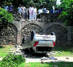 The car that fell into a park at Sector 68 in Mohali on Sunday.