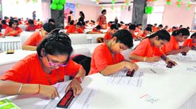 Children take part in the Abacus and Mental Arithmetic Competition at Sector 30, Chandigarh, on Sunday.
