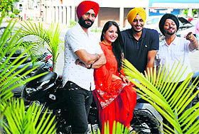 Star cast of "Kaum De Heere" poses for a photograph in Ludhiana.