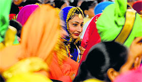 A participant waits for her turn during a talent-hunt competition at Ramgarhia College in Ludhiana. 