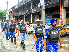 RAF personnel flag march after the July 26 violence that left three persons dead in Saharanpur. 