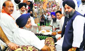 Deputy CM Sukhbir Badal along with SAD-BJP candidate Bhagwan Dass Juneja in Patiala on Sunday