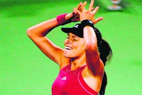 Ana Ivanovic celebrates after defeating Maria Sharapova in the semifinal of the Western & Southern Open in Cincinnati on Saturday