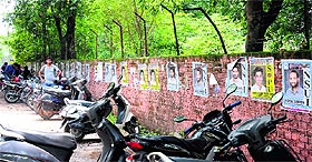 Posters seeking support for student leaders don the boundary wall of Sri Guru Gobind Singh College, Sector 26, Chandigarh.