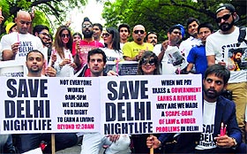 Activists of Save Delhi Nightlife during a protest against the 12:30 am deadline for nightlife venues, at Jantar Mantar in New Delhi on Monday. 