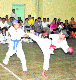 Players in action during the 8th District Karate Championship at the Indira Gandhi Sports Complex in Shimla on Monday. 