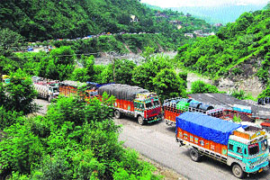 Vehicles stuck in a jam as landslide blocks the national highway near Mandi recently.