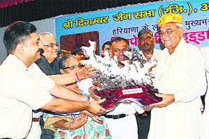 The Jain community confers the Jain Ratan title on CM Bhupinder Singh Hooda in Ambala Cantt on Monday