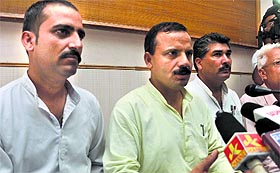 Panthers Party MLA Balwant Singh Mankotia (second from left) addresses mediapersons in Jammu on Monday.