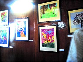 Paintings of US professor Sadaf Munshi on display at the J&K Cultural Academy in Srinagar on Monday.