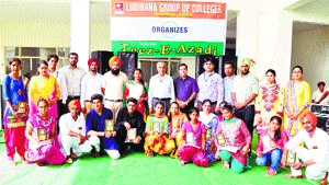 Students of the Ludhiana Group of Colleges, Chaunkiman, pose with their trophies during the Teez-e-Azadi function held at the college.