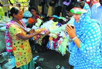 Congress candidate Preneet Kaur meets a voter in Patiala. Tribune photo: Rajesh Sachar