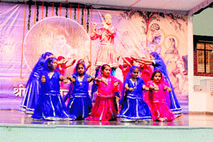 Students of Aryan School participate in Janmashtami celebrations in Dehradun on Monday.