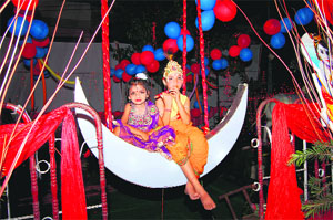 Children dressed as Radha and Krishna during the Janmashtami celebrations in Dehradun on Monday. 