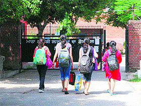 GNDU students return to their hostel as studies resumed from Tuesday in Amritsar.