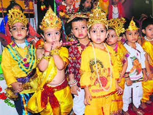 Tiny- tots dressed up as Lord Krishna celebrate Janamashtami In Bathinda.