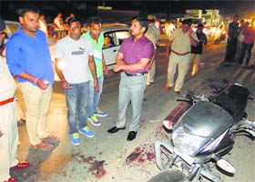 SP Abhishek Garg (centre) inspects the crime site in Karnal on Monday night