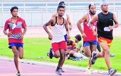 Sportspersons take part in a race during the trials-cum-competition conducted by the SAI Training Centre in Ludhiana on Tuesday. Tribune Photo: Inderjeet verma
