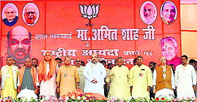 BJP national president Amit Shah with UP BJP chief Laxmikant Bajpai, Kalyan Singh, Lalji Tandon and others during a party workers meeting in Lucknow on Tuesday.