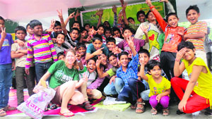 Jodie Underhill with street children during the start of cleanliness campaign at Gandhi Park in Dehradun on Tuesday