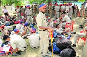 Cops day out: Policemen take a break while on duty in Talwandi Sabo ahead of the bypoll on Wednesday