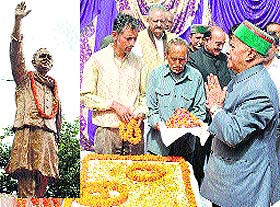 Chief Minister Virbhadra Singh pays floral tributes to late Prime Minister Rajiv Gandhi on his statue at the Sadbhawna Chowk in Shimla on Wednesday.